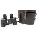 A mid 20thC pair of Bausch & Lomb 6 x 30 binoculars ,