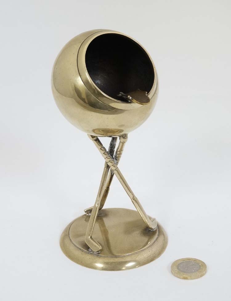 A vintage silver plate ashtray with crossed gold club support 6" high CONDITION: