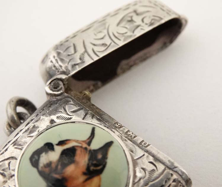 A silver vesta case with later applied 21stC ceramic cabochon with dog decoration. - Image 2 of 4