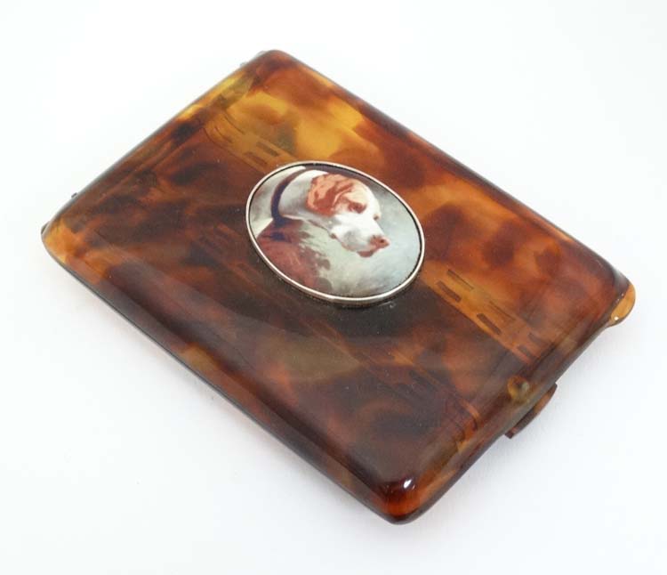A faux tortoiseshell cigarette case with later applied ceramic decoration depicting dog head, - Image 3 of 4