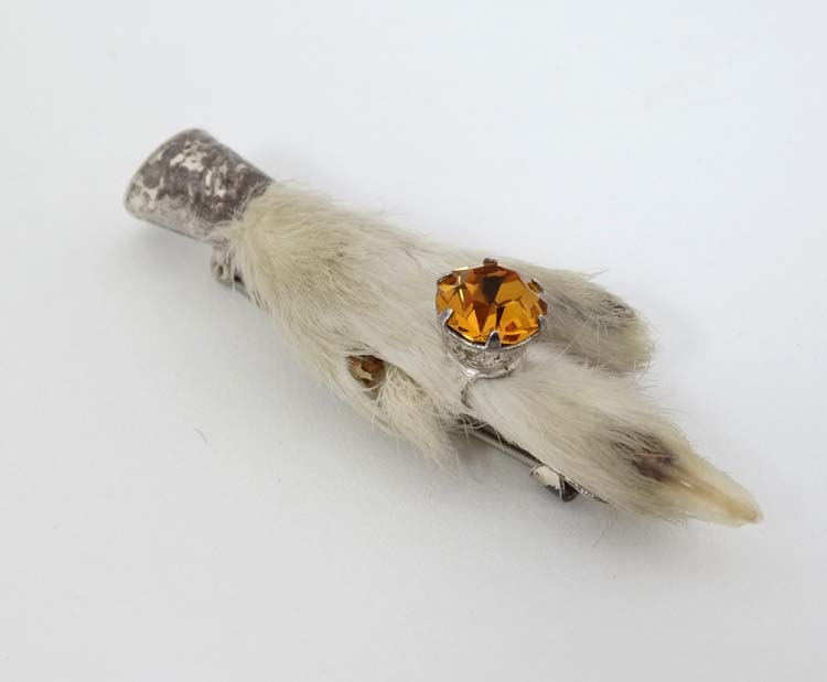 A silver mounted grouse foot brooch. Hallmarked Edinburgh c.1957 maker Ward Brothers.