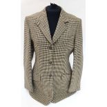 A Holland and Holland tweed blazer, size 8,