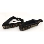 Shooting : Two Deerhunter cartridge belts , neoprene with 40DH Innovation camouflage finish ,