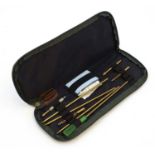 Shooting: A Napier cased rifle cleaning kit, comprising rod, brushes,