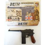 Airgun: a boxed KWC M712 'Broomhandle Mauser' .