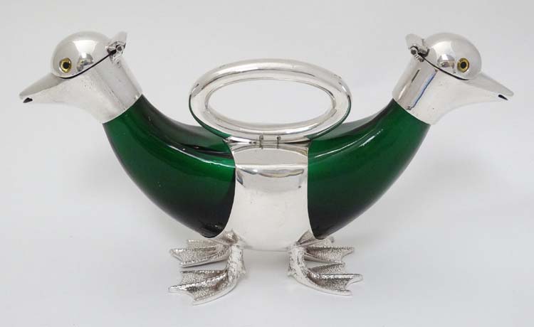 A 21stC novelty double ended small duck claret jug of green glass and silver plate ,