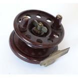 Fishing :A Modern Arms Co Bakelite Trotting Reel with two handles and 8 holes,
