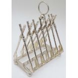 Rowing: A novelty 6-slice silver plated toast rack, the bars formed as oars.