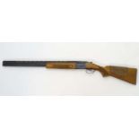 Shotgun: A Baikal 'MP233A' 12 bore over and under ejector shotgun,