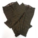 Two pairs of Laksen Tarland waterproof tweed breeks, size 34 and 38,