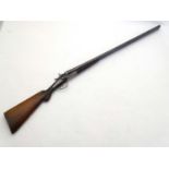 Shotgun: An English 12 bore back action non-ejector toplever hammergun (makers name on top rib