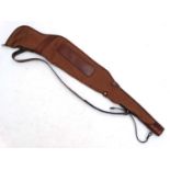 Shooting: A heavy leather and canvas 'scoped rifle slip, of Spanish manufacture,