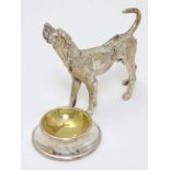 A novelty silver plate table salt formed as a dog stood before a bowl. 21stC.