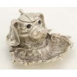 A late 20thC silver plated inkwell / Standish formed as a dogs head.