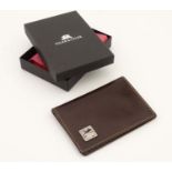 Rugby interest: A Tyler & Tyler leather card holder with image to one corner of a rugby player in