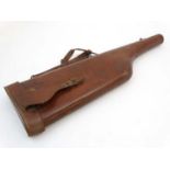 Shooting: An early to mid 20thC tan leather Leg o Mutton gun case, to fit 30" barrels (max),