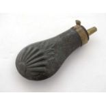 Shooting: A 19thC pewter and brass pistol powder flask,