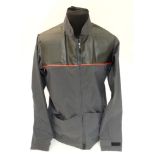 A Musto Evolution Caly Shooting Jacket, in Carbon Lite colour, size M,