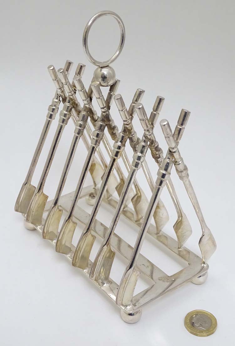 Rowing: A novelty 6-slice silver plated toast rack, the bars formed as oars. - Image 8 of 14