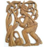 Shooting: A 1987 wooden carving of a Negro figure with gun hunting a bird among trees, signed M.