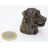 A novelty brass vesta case formed as a dogs head.