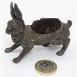 A Victorian Novelty pen wipe formed as a cast model of a hare with red painted eyes and bristles to