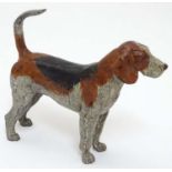 A cold painted bronze figure of a hound / dog. 21stC.