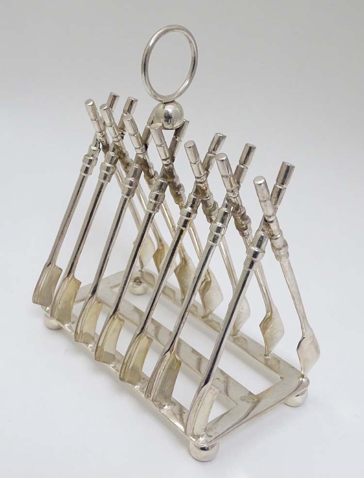 Rowing: A novelty 6-slice silver plated toast rack, the bars formed as oars. - Image 6 of 14