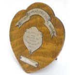 Golfing Interest : A silver mounted oak presentation / trophy shield for Carnavonshire & District