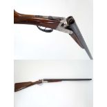 Shotgun : A 12 bore Side by side boxlock ejector by Master ,