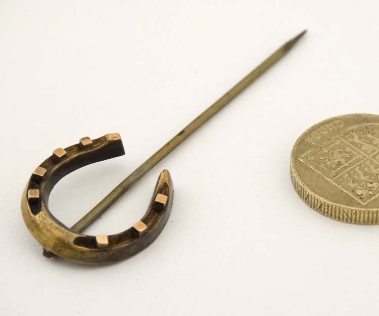 A gilt metal stick pin surmounted by a horseshoe 2 3/4" long CONDITION: Please - Image 2 of 2