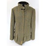 A Joules tweed fieldcoat in toad green colour,