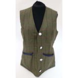 A ladies Musto stretch technical tweed Jacket Gilet,