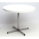 Vintage Retro : A Scandinavian circular white and chromed steel pedestal table ,