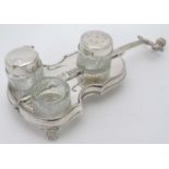 A 21stC novelty silver plate cruet set with stand formed as a violin / cello CONDITION: