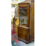 A 21stC Glazed mahogany corner cupboard CONDITION: Please Note - we do not make