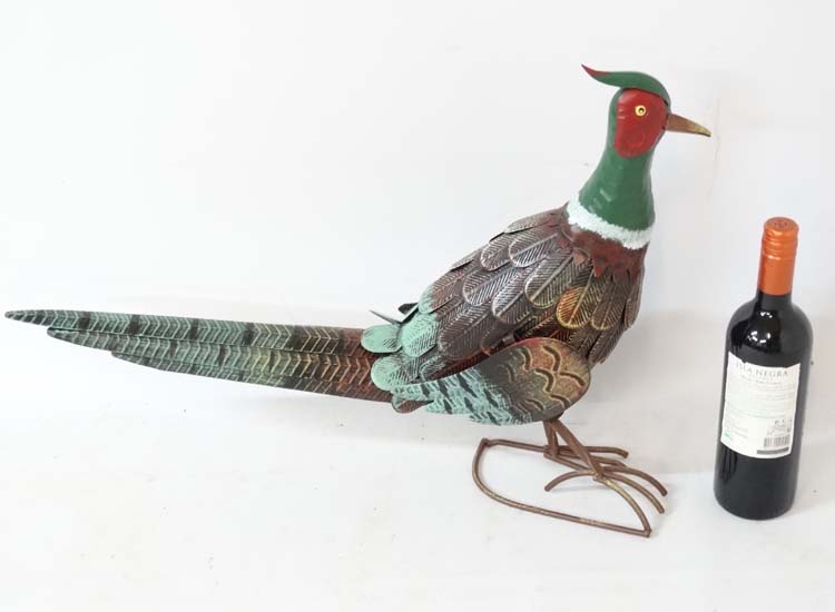 A 21st C Kreatif Kraft hand painted metal 'Pheasant' garden ornament,
