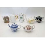 A collection of 7 teapots , to include examples by Copeland Spode, Foley China, T.