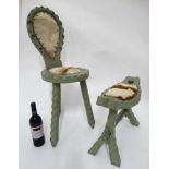 Green painted cowhide upholstered single spinning chair with a matching foot stool