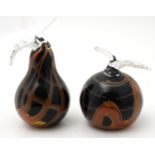 A pair of Studio Art glass Murano style glass paper weights in the form of an apple and a pear in