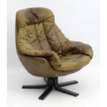 Vintage Retro : a Danish swivel leather bucket chair as designed by H W Klein for Bramin ,