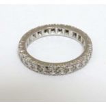 A 18ct white gold diamond set eternity ring CONDITION: Please Note - we do not