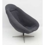 Vintage Retro :a 1960's 'Lura shell' swivel chair with squared pattern upholstery ,