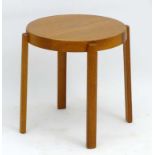 Vintage Retro: a 1960's Danish teak four legged circular occasional table,