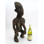 Tribal : An Ethnographic Native Tribal Cameroons Bangwa figure with crusty patina. Approx. 27" high.
