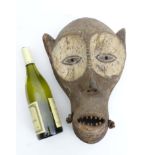 Tribal : An Ethnographic Native Tribal Congolese 'Monkey' mask. Approx. 15 1/2" high.