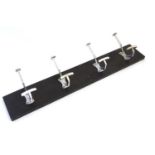 Vintage Retro :a mounted set of 4 Art Deco chromed coat hooks fixed on an ebonised wooden board ,