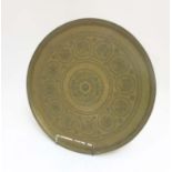 An early 20thC punchwork and cast brass Moroccan tray 18" diameter CONDITION: Please