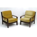 Vintage Retro: A pair of Danish open arm lounge chairs,