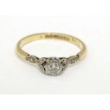 A 9ct gold ring with platinum set diamond CONDITION: Please Note - we do not make